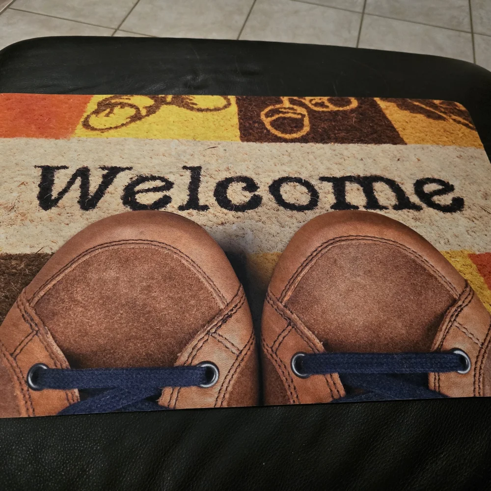 Brown Welcome Mat with Shoe Design